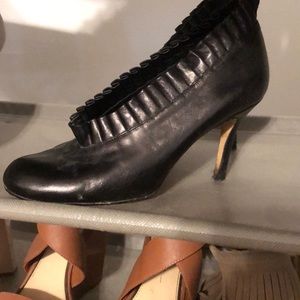 Black ruffle heels